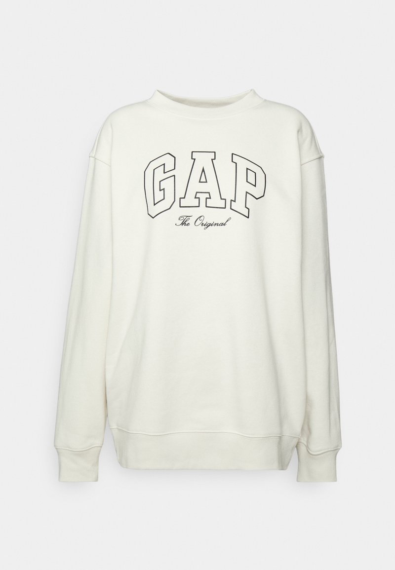 Krémová mikina s kulatým výstřihem, s velkým černým logem "GAP" a pod ním menším písmem nápis "The Original".