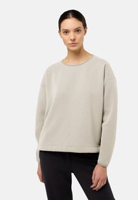 Hellgrau, Langarm-Sweatshirt mit Rundhalsausschnitt und geripptem Saum. Weiche Textur mit überschnittenen Schultern und lockerer Passform.
