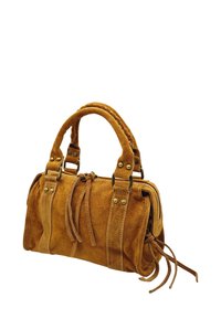 Sac en daim marron avec double anses, coutures décoratives et quincaillerie dorée. Il dispose de glands sur les côtés et d'une fermeture éclair.