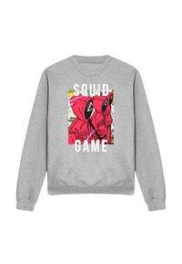 Gray sweatshirt featuring a colorful graphic with two characters in red hoodies and the text "SQUID GAME" centrally displayed.