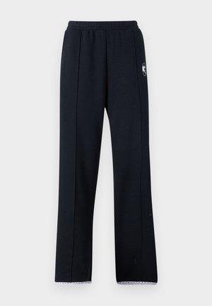 Zwarte sweatpants met een ontspannen fit, voorzien van een elastische tailleband, zijnaad en witte kantafwerking aan de onderkant. Gemaakt van zachte stof.