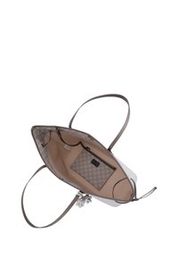 Sac fourre-tout de couleur claire avec un extérieur texturé, des poignées lisses et un intérieur à motifs. Comprend une pochette zippée assortie à l'intérieur.