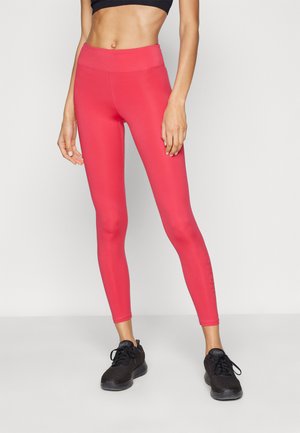 Magas derekú, testhez simuló leggings élénk rózsaszínben, rugalmas, sima anyagból, látható minták vagy díszítések nélkül.