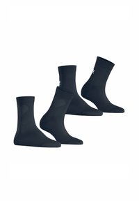 Set aus schwarzen Baumwollsocken, bestehend aus drei Paaren. Geripptes Design mit verstärkten Fersen und Zehen, glatte Textur, mittellange Ausführung für zusätzlichen Komfort.