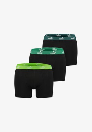 Schwarze Boxershorts im Drei-Pack, mit grünen und dunkelgrünen elastischen Bündchen mit Puma-Logo, aus glatter Stoffqualität und körperbetonter Passform.