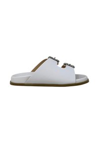Le sandali aperti bianchi hanno una suola piatta e presentano due cinghie decorative con gemme. La soletta è piatta con un leggero accento color crema. Realizzati in materiale sintetico.