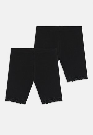 Deux paires de shorts noirs mi-genoux avec une bordure en dentelle aux ouvertures des jambes, présentées à plat sur un fond blanc.