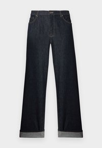 Široké nohavice z tmavého denimu s manžetami, gombíkovým zapínaním a prednými vreckami. Tkanina má hladkú textúru so jemnými stehmi.