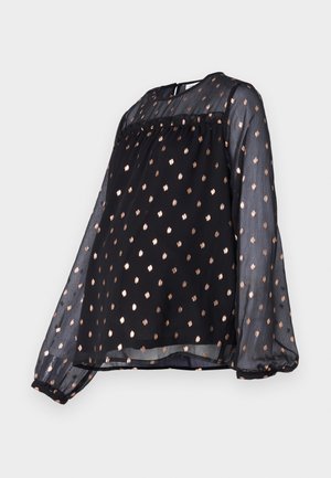 Dlhý rukáv čierna blúzka z priesvitného materiálu s okrúhlym výstrihom a zlatým bodkovaným vzorom po celom povrchu. Voľný strih s naberanými manžetami.