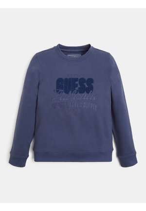 Sweatshirt bleu marine à col rond, manches longues, et logo texturé "GUESS Authentic". Tissu doux avec une texture lisse et des poignets côtelés.