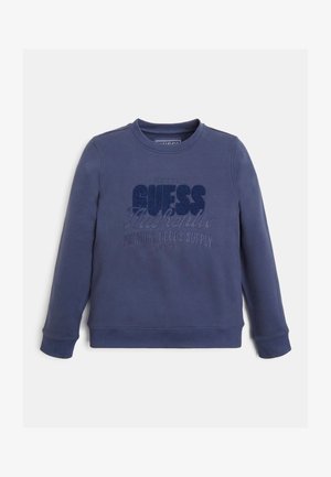 Marineblauwe sweatshirt met ronde hals, lange mouwen en een textuur met het "GUESS Authentic" logo. Zachte stof met een gladde textuur en ribgebreide manchetten.