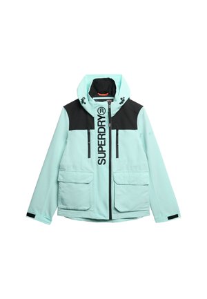 Licht mintgroene jas met zwarte accenten, voorzien van een capuchon, een rits aan de voorkant en de tekst "SUPERDRY" in het midden. Inclusief twee zijzakken.