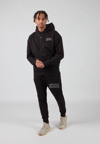 Wrong Friends ORLANDO - Trainingsbroek - zwart