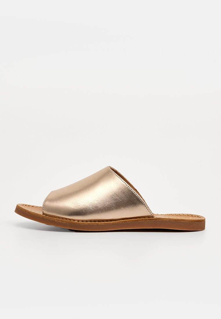 POM D'API Mules doré