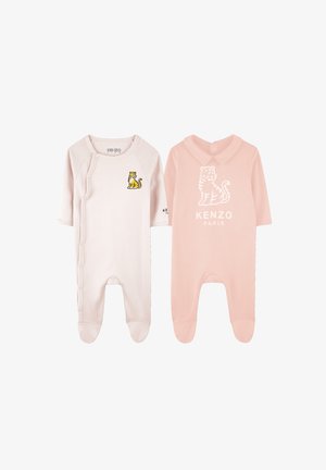 Deux bodies pour bébé : l'un rose clair avec un graphisme de tigre, l'autre crème avec des boutons-pression sur le côté et un accent de tigre brodé. Tissu en coton doux.