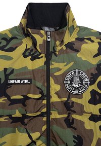UNFAIR ATHLETICS - Kurtka przejściowa