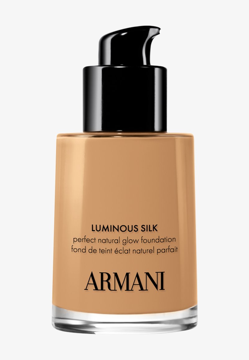 Luminous Silk-foundationsflaske fra Armani med svart pumpe, brun flytende foundation og svart tekst på frontetiketten.