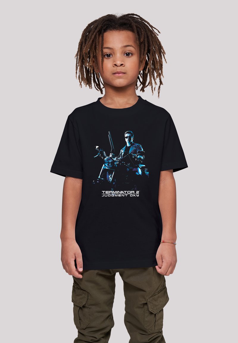 Black cotton t-shirt featuring a blue graphic of Terminator 2 characters and text "TERMINATOR 2 JUDGMENT DAY" on the front.
