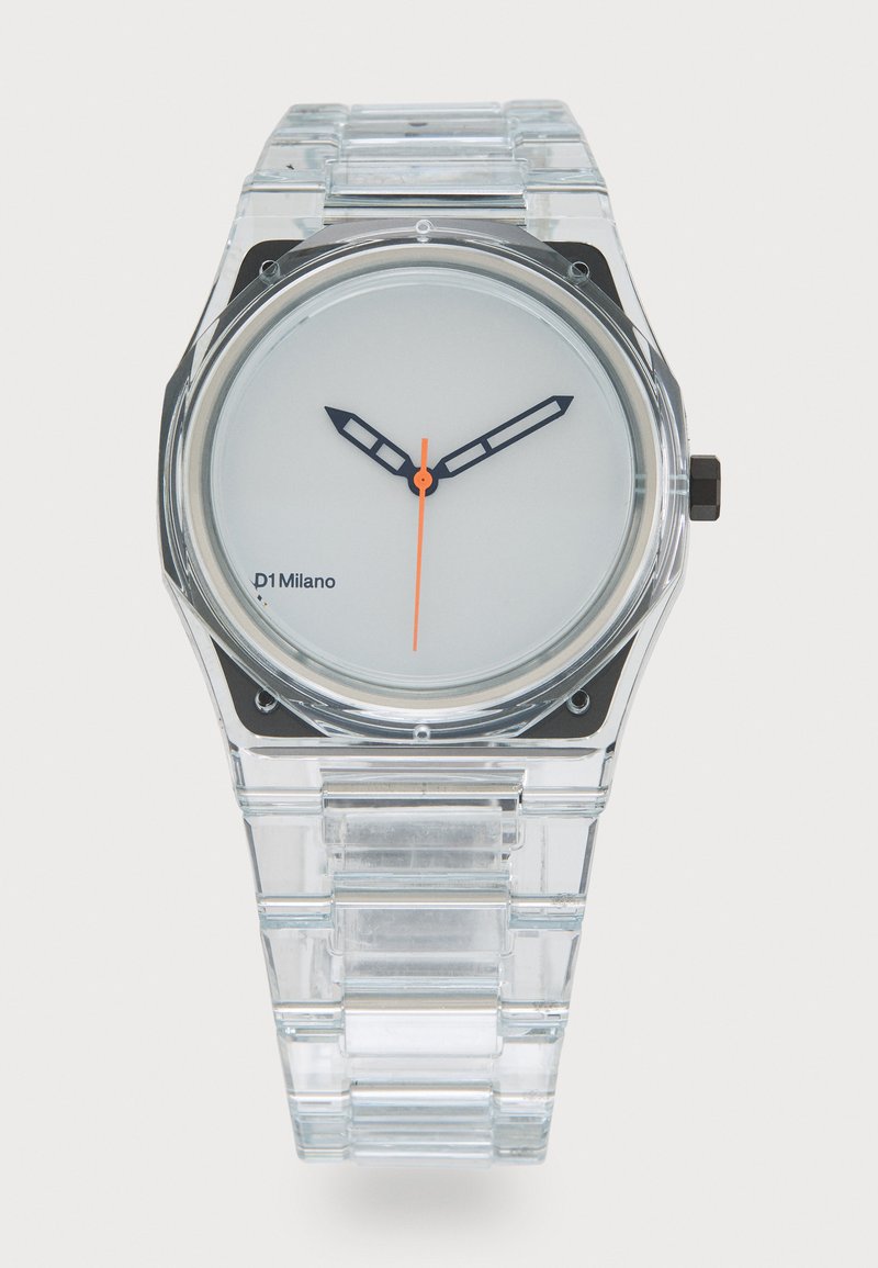 Átlátszó műanyag óra kerek fehér számlappal, fekete órakilencesekkel és narancssárga másodpercmutatóval; átlátszó lánckarkötővel és négyzet alakú tokjával rendelkezik.