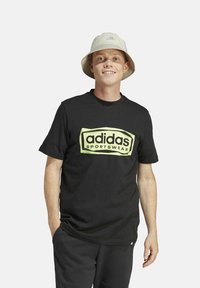 adidas Performance FLD SPW LOGO - T-shirt con stampa - black