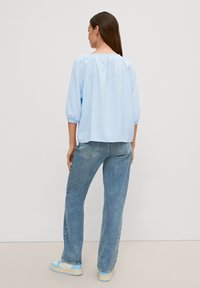 comma casual identity Bluzka