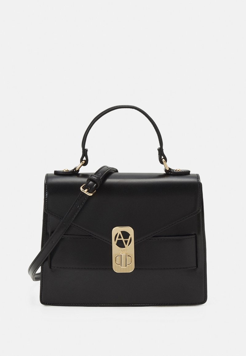 Sac à main rectangulaire noir avec poignée supérieure, fermoir doré avec logo et bandoulière réglable sur fond blanc.