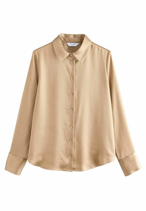Camicia beige in satin a maniche lunghe con colletto a punta, chiusura con bottoni e maniche con polsini. Tessuto liscio con una leggera lucentezza.