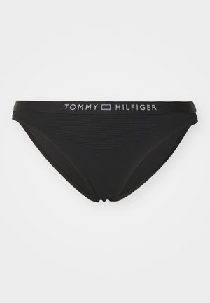 Fekete bikini alsó, textúrált anyagból, kontrasztos fehér "TOMMY HILFIGER" logóval a derékpánton. Klasszikus fazon.