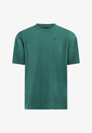 Kurzärmeliges T-Shirt mit Rundhalsausschnitt in ausgewaschenem Tealgrün mit kleinem geprägtem Logo auf der linken Brust und abgesteppten Schulternähten.