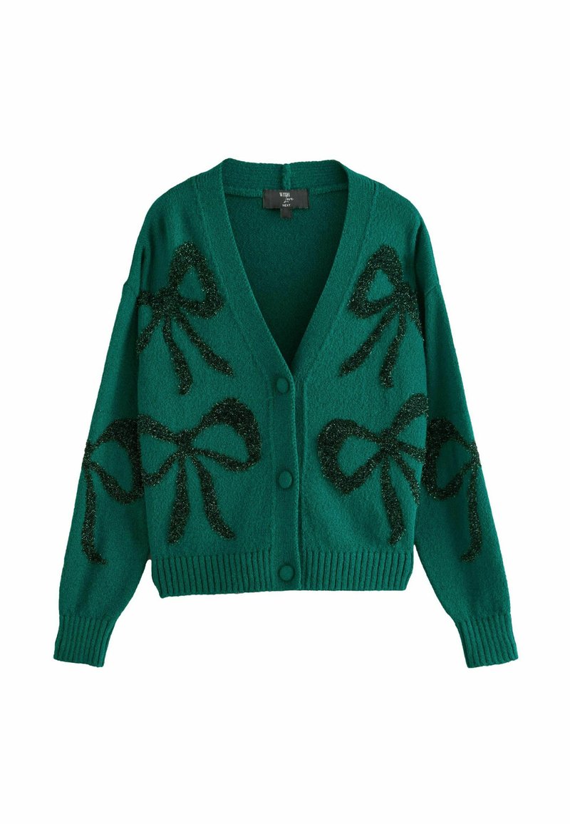 Groene gebreide cardigan met zwarte pailletten strikpatronen, v-hals, knoopsluiting en geribde manchetten en zoom. De textuur lijkt zacht.
