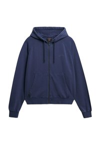 Sudadera con cremallera en navy de tejido suave, con capucha ajustable, dos bolsillos frontales y puños acanalados. Presenta un logo en relieve sobre el bolsillo izquierdo.