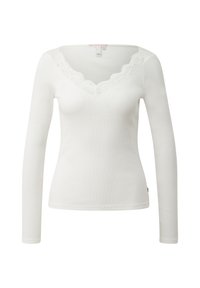 Weißes, langärmeliges, eng anliegendes Oberteil mit V-Ausschnitt und Spitzenbesatz am Ausschnitt und den Schultern.