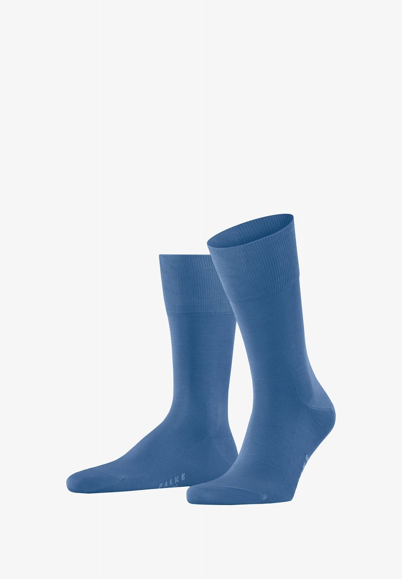 Blaue Baumwollsocken mit geripptem Bündchen und glatter Textur. Mit subtiler Markenkennzeichnung an der Sohle, entworfen für Komfort und Passform.