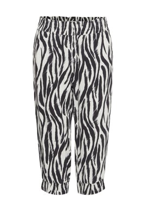 Pantaloni a strisce zebrate in bianco e nero realizzati in tessuto leggero, con vita elastica e polsini elastici alle caviglie.