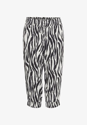 Hlače sa zebra uzorkom u crno-bijeloj boji izrađene od lagane tkanine s elastičnom trakom u struku i elastičnim rubovima oko gležnjeva.