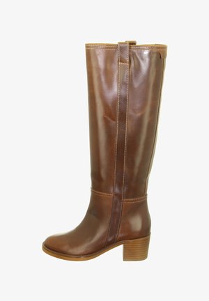 Brown leather knee-high boot with stacked block heel and pull tabs on a white background.