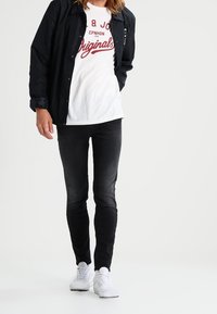 Diesel Vaqueros pitillo - dark-blue denim