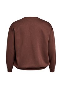 Rudas megztinis su apvalia iškirpte, ilgomis rankovėmis, ribotais rankogaliais ir laisvu siluetu. Minkšta tekstūra su lygiu paviršiumi.