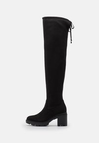Stivali neri sopra il ginocchio in morbida suede, con tacco chunky e chiusura a coulisse nella parte superiore per una vestibilità regolabile.