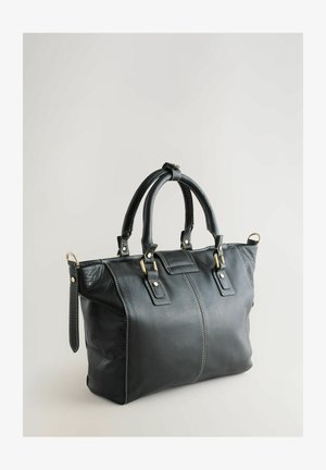 Must musta käekott kahe ülemise käepidemega, kuldse tooni detailid, kontrastsete valgete õmblustega ja struktureeritud ristkülikukujuline kuju.