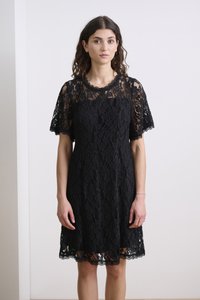 Black lace dress with short, flared sleeves, scalloped neckline, and hem. Intricate floral pattern throughout, semi-sheer texture.