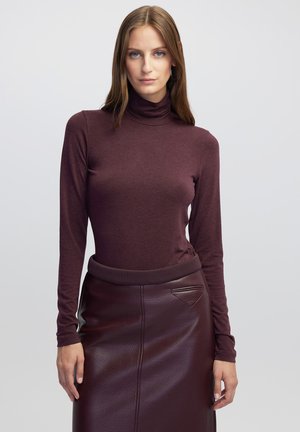 - Sweter