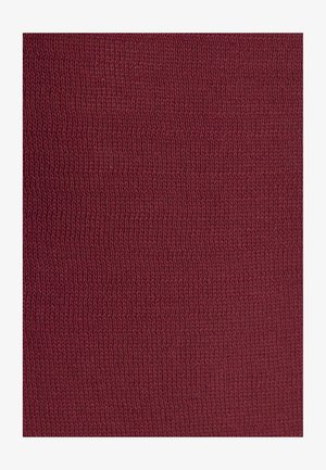 Tissu tricoté bordeaux avec une surface douce et texturée, présentant un motif régulier de fils fins entrelacés.