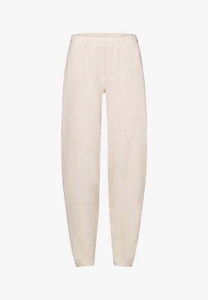 Svetle béžové bavlněné kalhoty s elastickým pasem, volným střihem a zužujícími se nohavicemi. Hladká textura a bez viditelných vzorů.