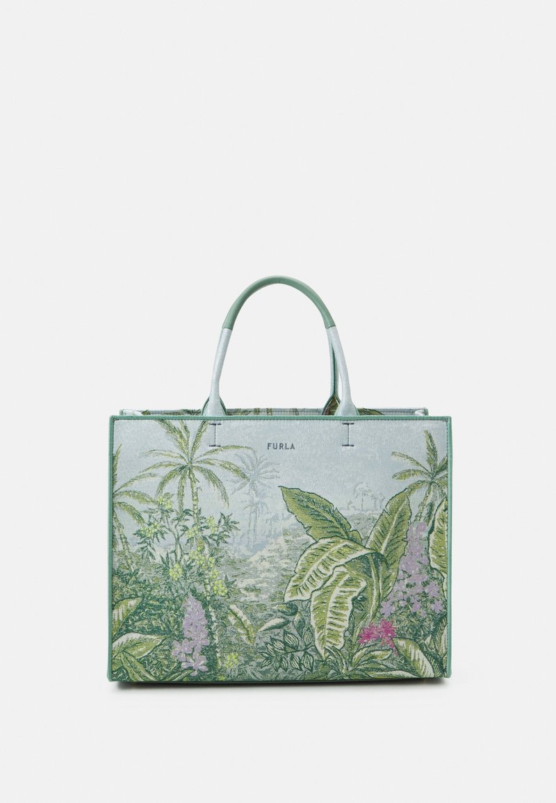Sac fourre-tout rectangulaire avec anses vertes et un imprimé botanique tropical mettant en avant de grandes feuilles et des fleurs sur un fond clair.