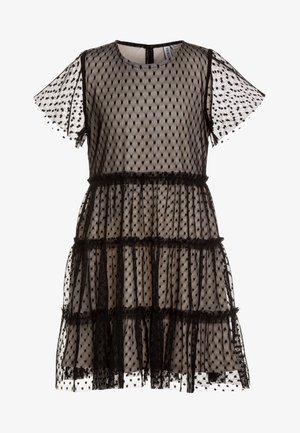 Robe noire transparente à pois avec manches courtes et volants superposés sur une doublure beige.