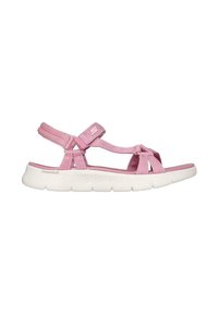 Sandalias deportivas rosas con correas de tejido texturizado, hebilla ajustable, punta abierta y suela blanca acolchada para mayor comodidad y soporte.