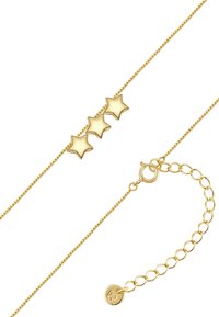 Guldarmbånd med tre stjerneformede accenter med en glat finish, kassekæde-design og en hummerlås med justerbar længde.