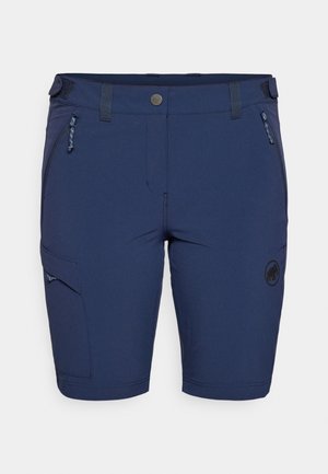 Granatowe szorty wykonane z elastycznego materiału, z zamkiem błyskawicznym z przodu, kieszenią boczną i akcentem z logo. Gładka tekstura, długość do kolan.