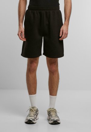 ESSENTIAL  - Tracksuit bottoms - black